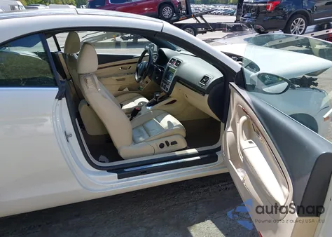 2009 Volkswagen Eos Lux from USA, damaged, VIN WVWFA71F69V019896